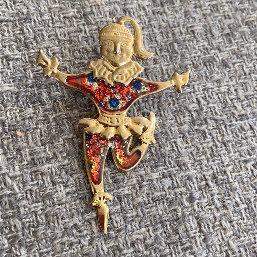 Moving Dancer Gold Colored Pin